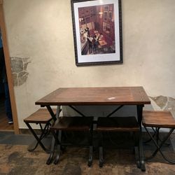 Table and Four Bench Chairs. Table Has Normal Wear Tear. 