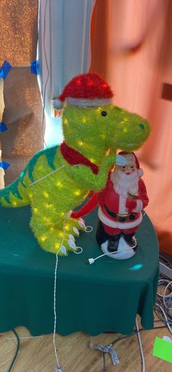 Christmas Tinsel Dinosaur Decoration. Only $27.00. Why Pay $80.00? Kids Love Jurassic Park.