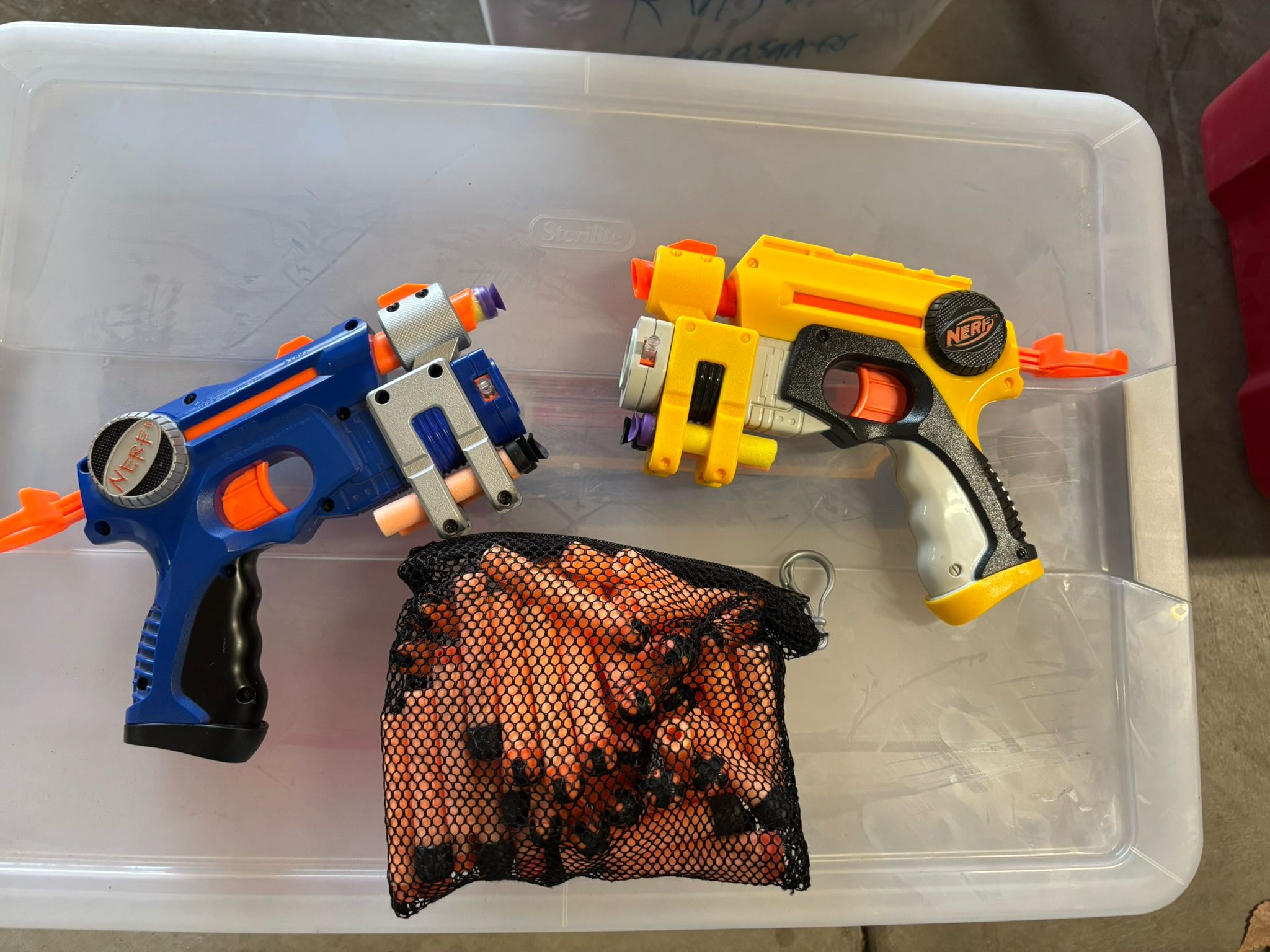 Two nerf guns and extra bullets