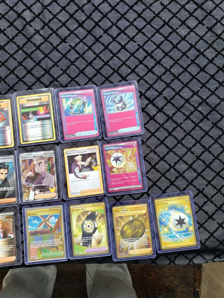 Trainer Pokémon cards some gold Pokémon cards some NBA Stamp some pink Cards selling By Lot $444 all or best offer $30! Each