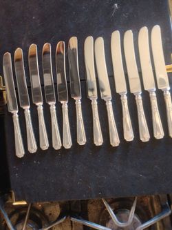 12 sterling butter knifes 1000