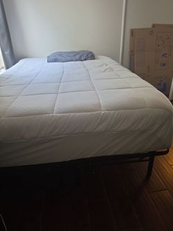 Mattress with Black Metal Bed Frame
