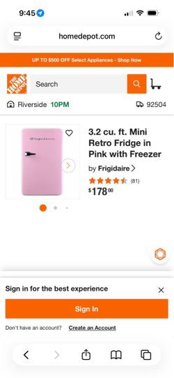 Mini retro fridge in pink with freezer