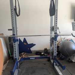 Squat Rack And Weights 