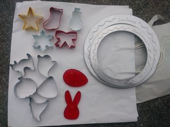 Lot of Baking items. Pie crust protectors.cookie cutters
