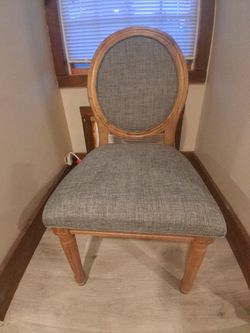 Set of 4 dining room chairs. Great condition. No rips or stains. No wobbly legs.