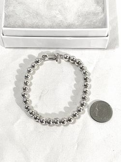 Brand new 7” .925 Silver bead strand bracelet.