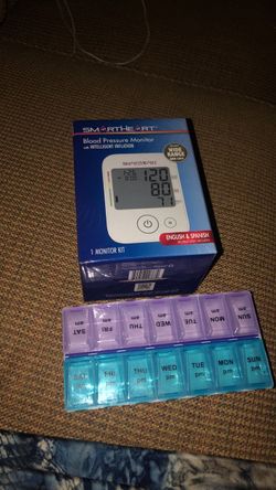 Blood pressure monitor & pill organizer