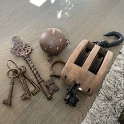 Vintage wood pulley, heavy ball with a shackle, heavy keys