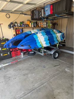 Kayaks and towing trailer