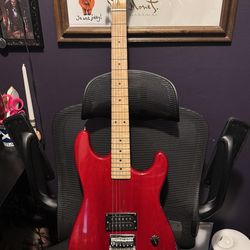 Red electric guitar and amp