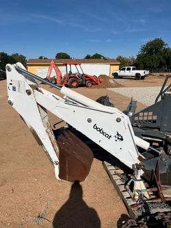 Backhoe attachment for bobcat