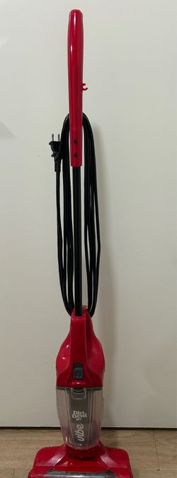 Compact Vibe stick vacuum. Red color. Has clear dustbin. Works great.
