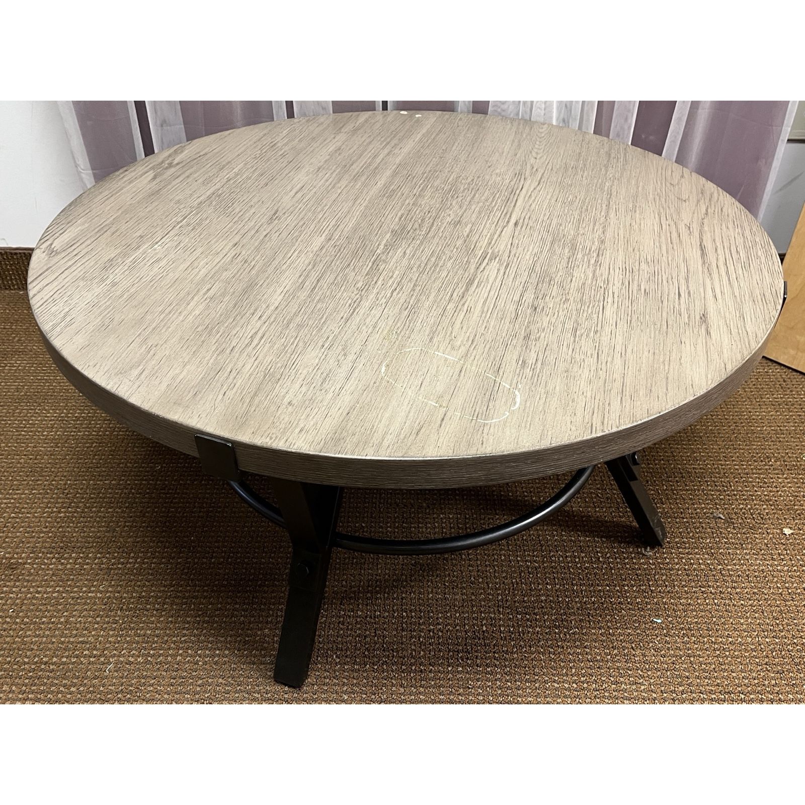 Round Coffee Table, Cocktail Table. Center Table. Signature Design by Ashley Zontini Industrial Light Brown and Black.