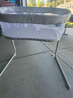 Beautiful white and gray bassinet brand new