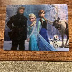 Disney Frozen Lenticular 48 Piece Puzzle Finished 12 x 9 Inches. Piece by Sven’s nose is lifting on 1 corner 