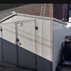 Large  vinyl 10x8 Shed Insulated comes apart in pieces easily