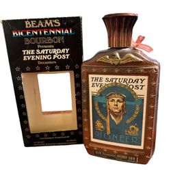 This empty decanter with its original box is from the famous Jim Beam Bicentennial collection.  Features Norman Rockwell's cover of the May 26, 1945 e