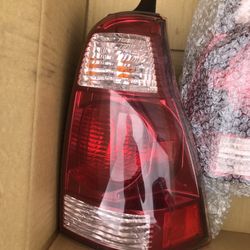 Factory Tail Lights W/Bulbs - Driver and Passenger - 2004 Toyota 4Runner Limited-