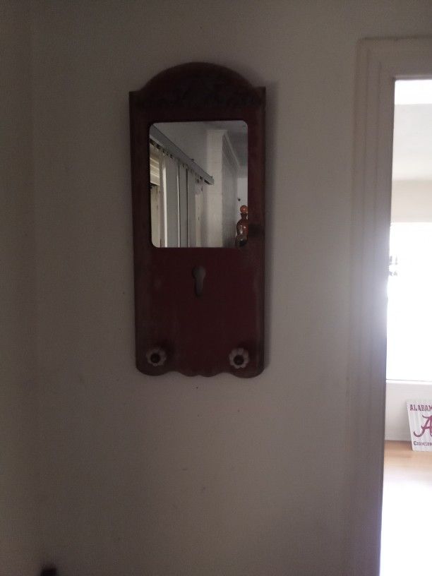 Rust colored antique mirror