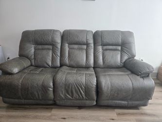 Three seater sofa with recliner