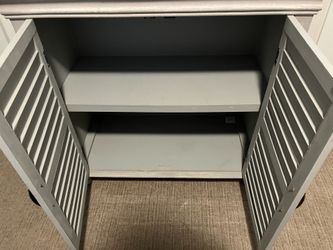 Stylish grey wooden cabinet