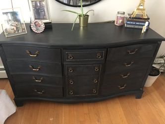 Solid wood antique refinished dresser.