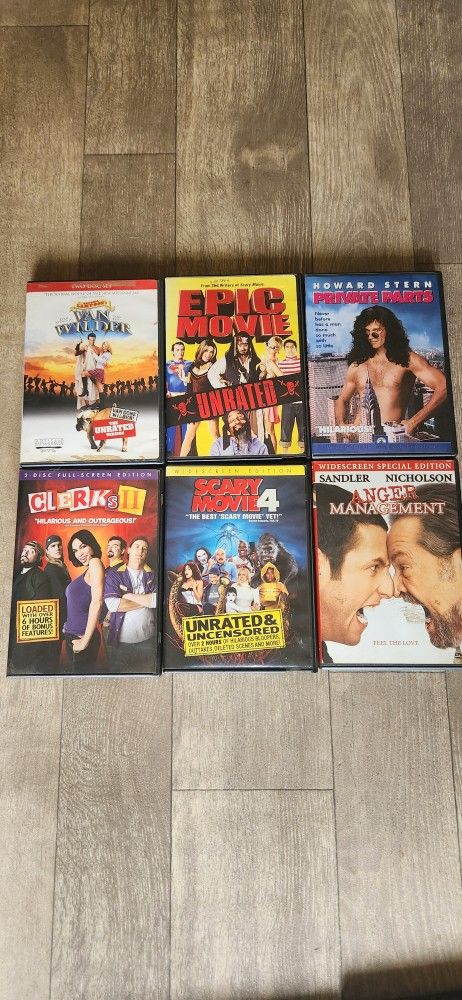 56 DVD Movies 🎬  And 2 DVD Holder Stands 
