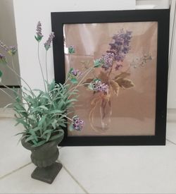 Beautiful decor faux lavender plant and framed picture.