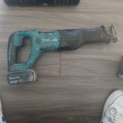 Makita Sawzall  2 battery a charger port an 2 drills
