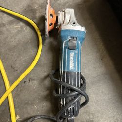 Makita GA4030 compact 4-inch angle grinder. 