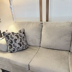 Beautiful sofa with chaise By Ashley