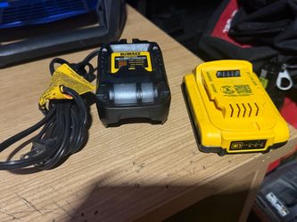BRANDNEW BATTERY AND CHARGER
