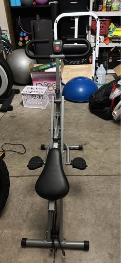 Sunny health and fitness squat  Assist row -n-ride training .