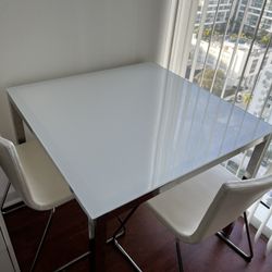 Used Glass Table With 2 Leather Chairs