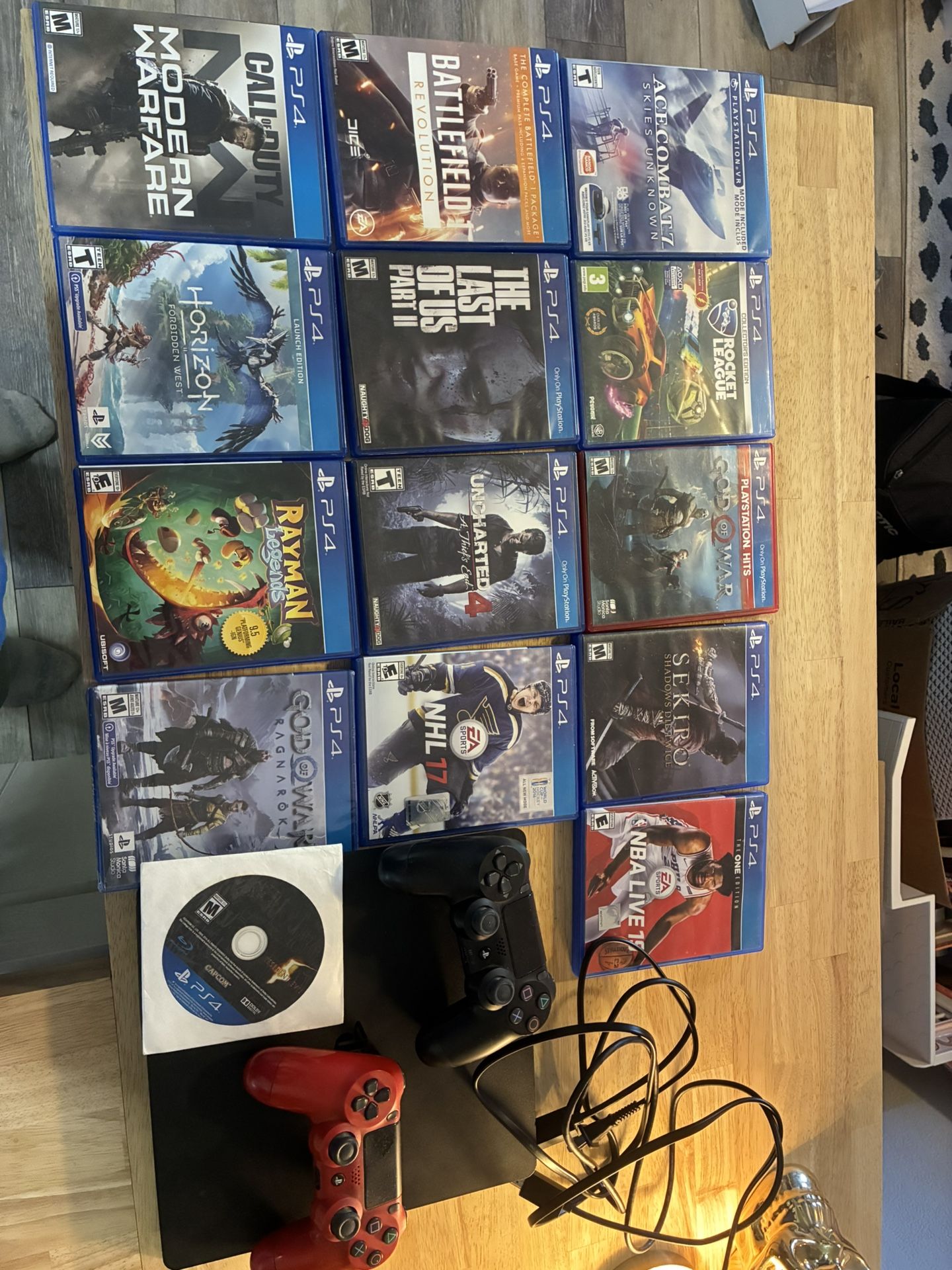 PS4 SLIM 14 Games Two Controllers All Cords. 