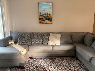 Large Gray Fabric Sectional Sofa with full size bed