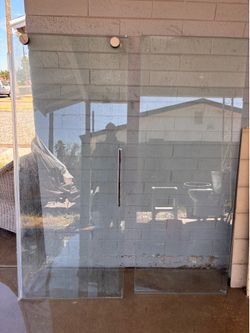 Sliding shower glass doors