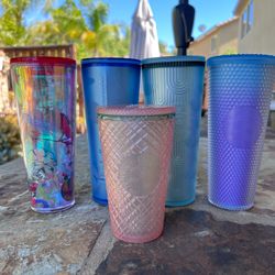 Starbucks 4 20oz tumblers and one small one