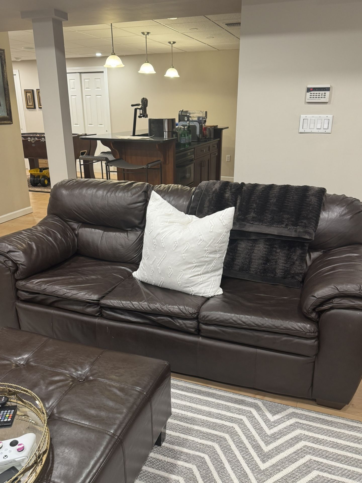 Brown Leather Soda Sleeper and Two Loveseats