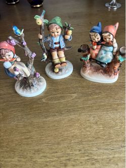 These are authentic, vintage Goebel Hummel porcelain figurines from Germany,