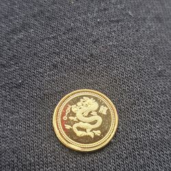 Gole over silver coin