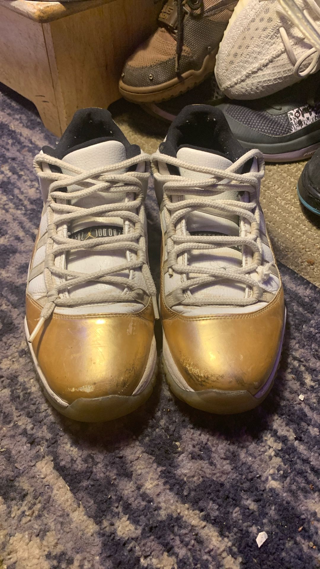Jordan 11s Low Gold
