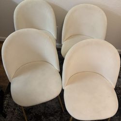 4 Chairs In Excellent Condition 