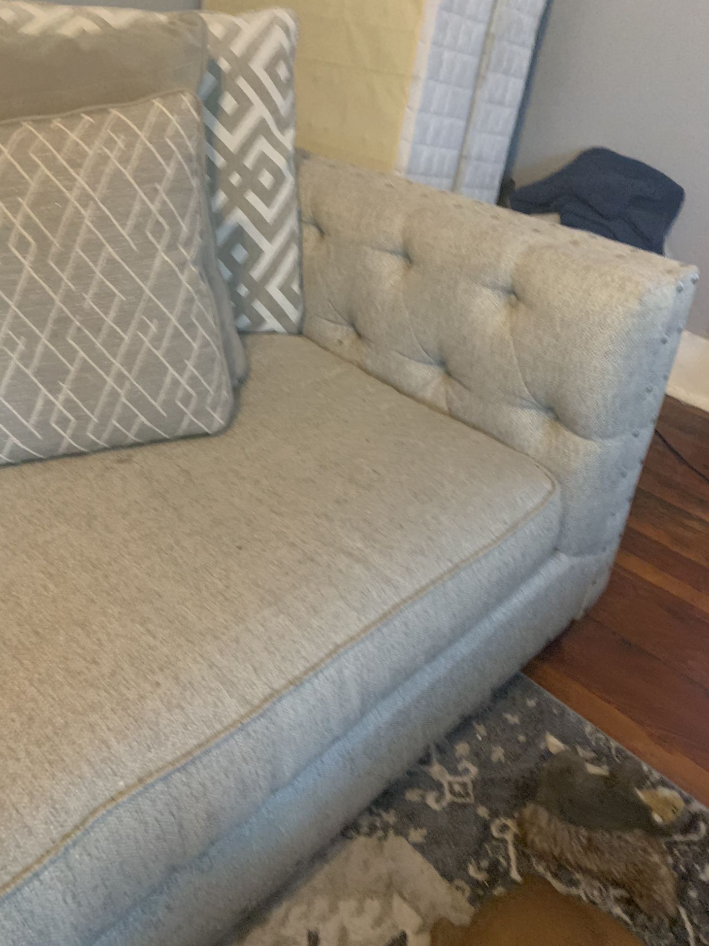 Beige and grey couch.