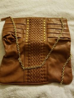 Aldo camel small clutch.