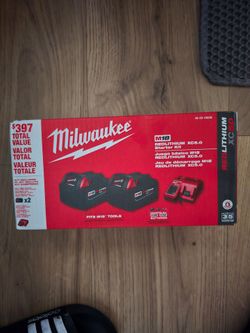Milwaukee 2 batteries and charger