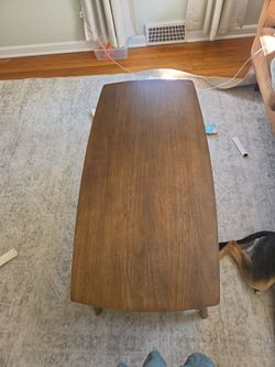 Ashley's wooden living room.table.