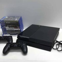 ps4 with 2 controllers and 10 games