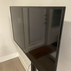 Black Vizio 43” 4k Smart TV & Adjustable TV Stand